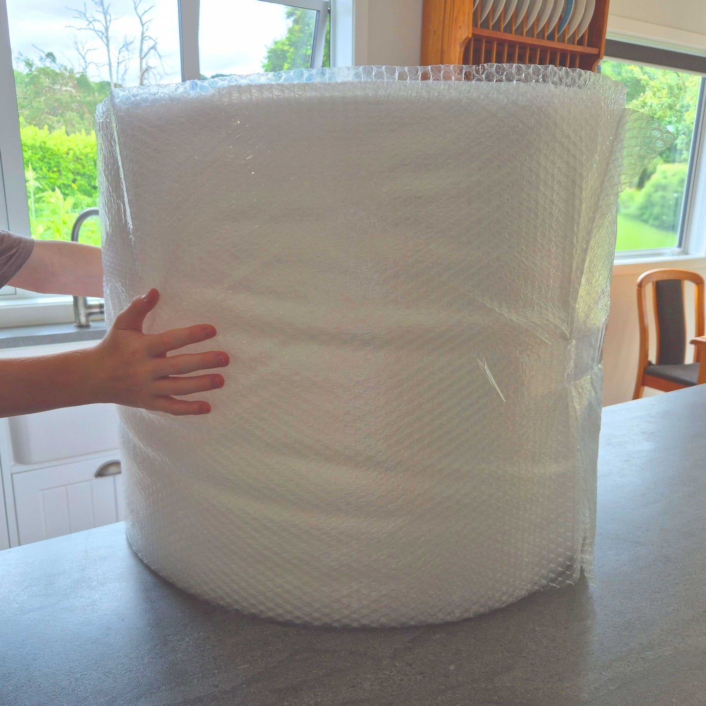 100 m roll of bubble wrap used to protect fragile items during moving