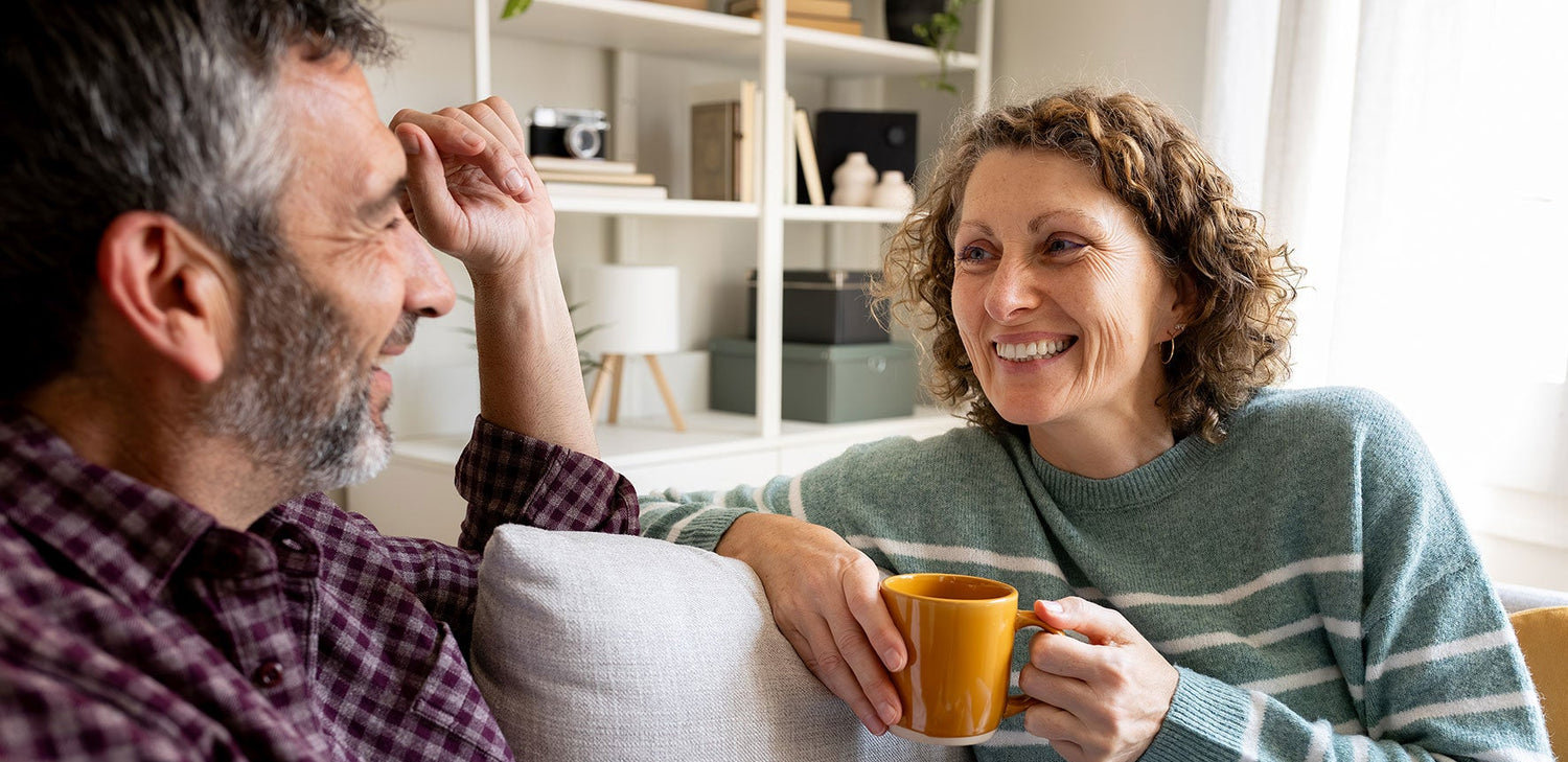 couple happy relaxing after moving house with Settled and Sorted Move Managers