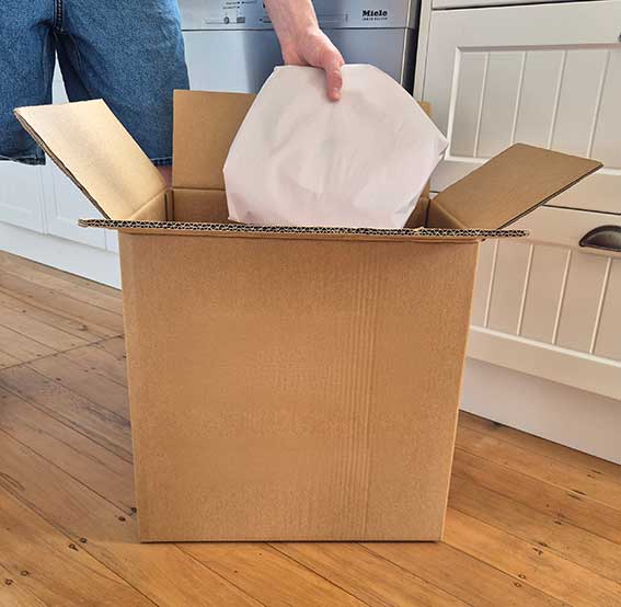 Medium cardboard packing box for moving