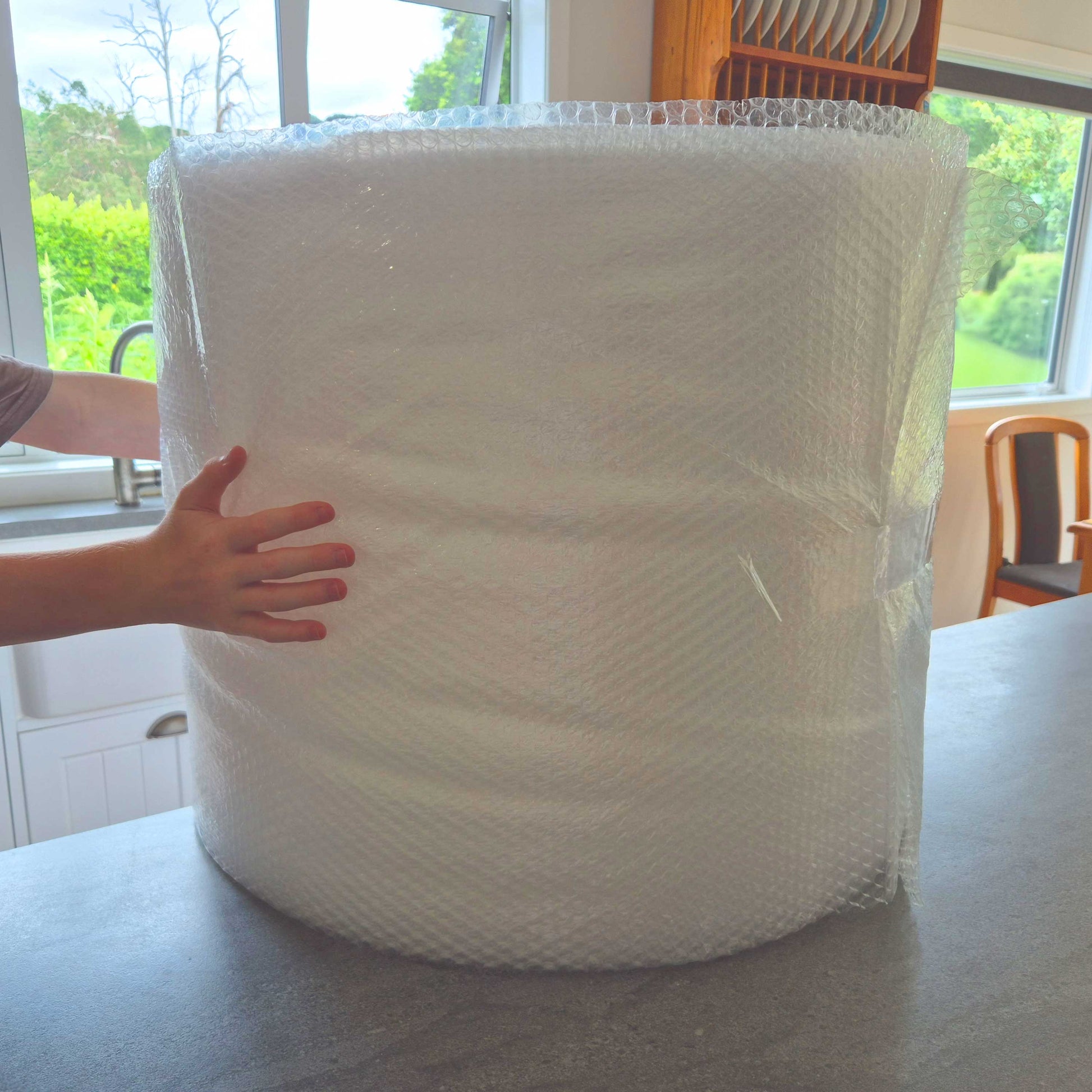 100 m roll of bubble wrap used to protect fragile items during moving
