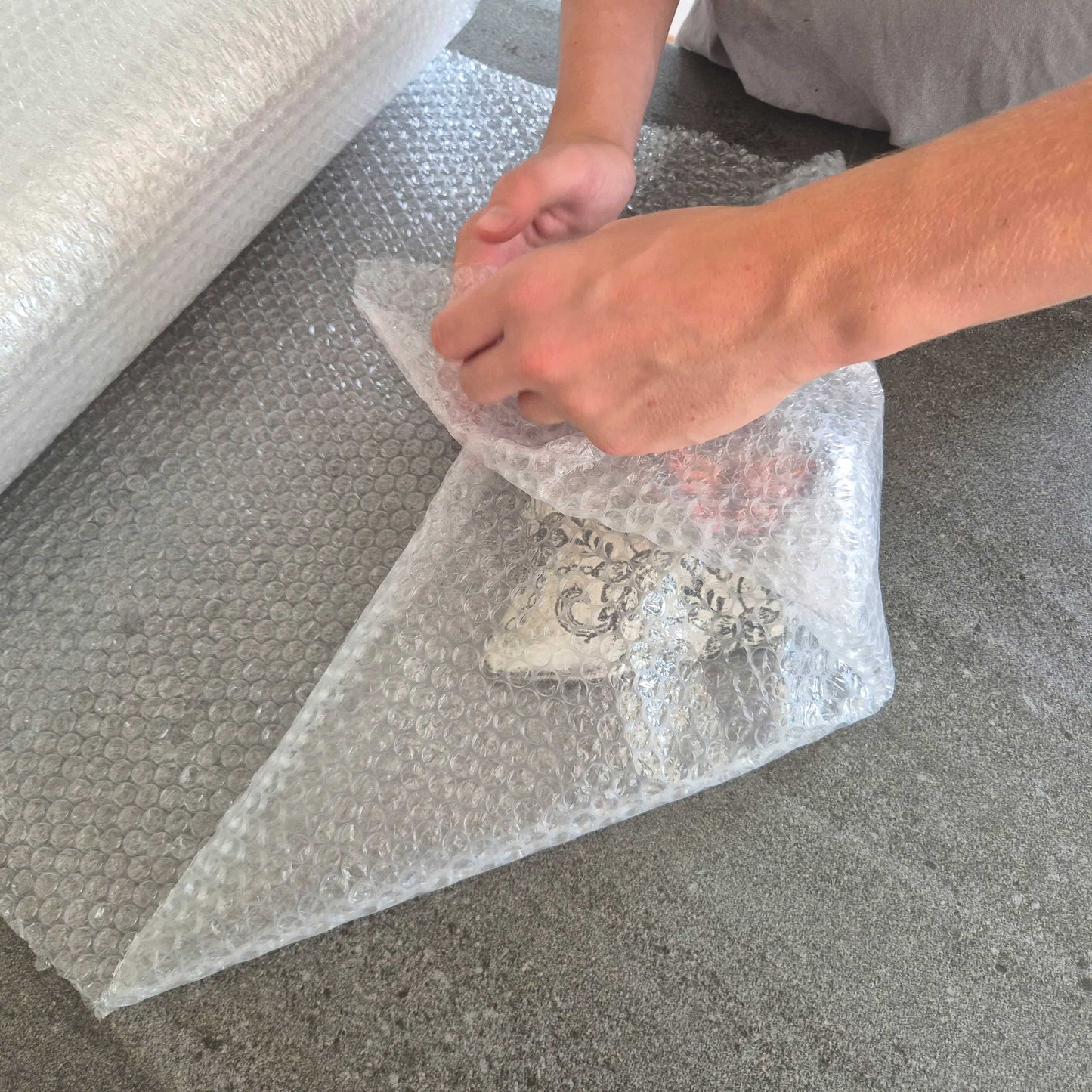 Bubble wrap used to wrap fragile household items for moving