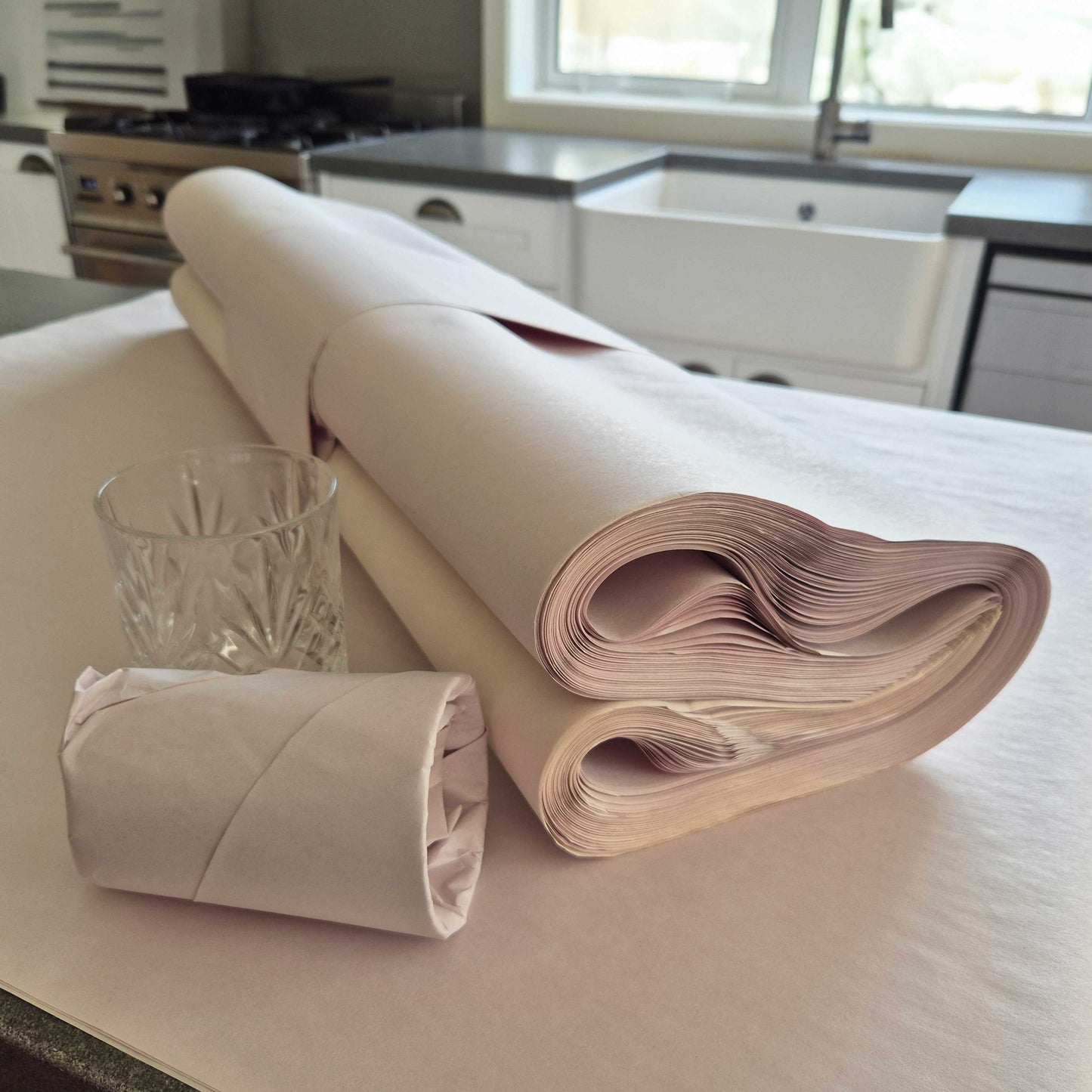 Ream of clean, unprinted packing paper used for wrapping items during moving